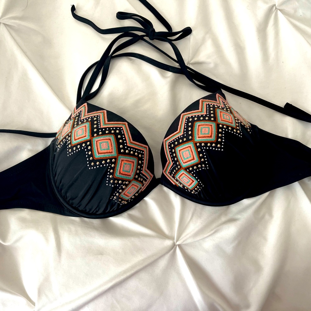Push up bikini bathing suit tie top with silver embellishments.